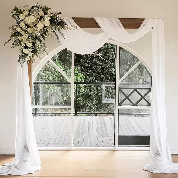Simple white flower arch