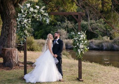 White wedding flower arch